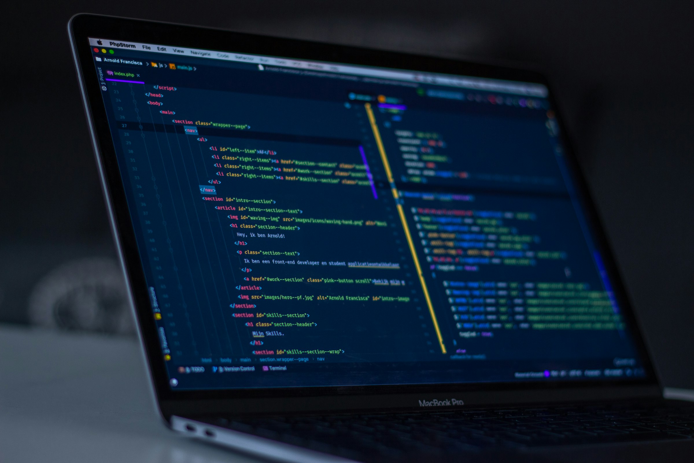 Close-up of colorful source code on a developer monitor